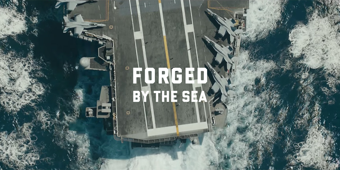 US Navy digital first campaign poster for 'Forged by the sea'